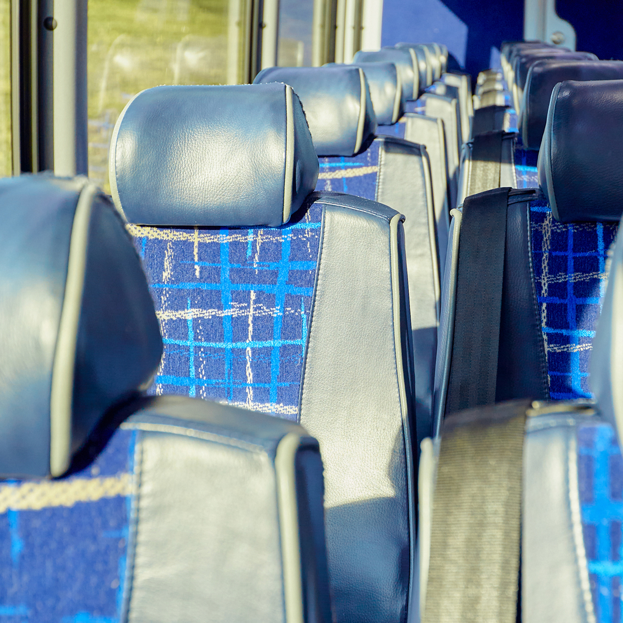 Luxury motorcoach bus seat headrest
