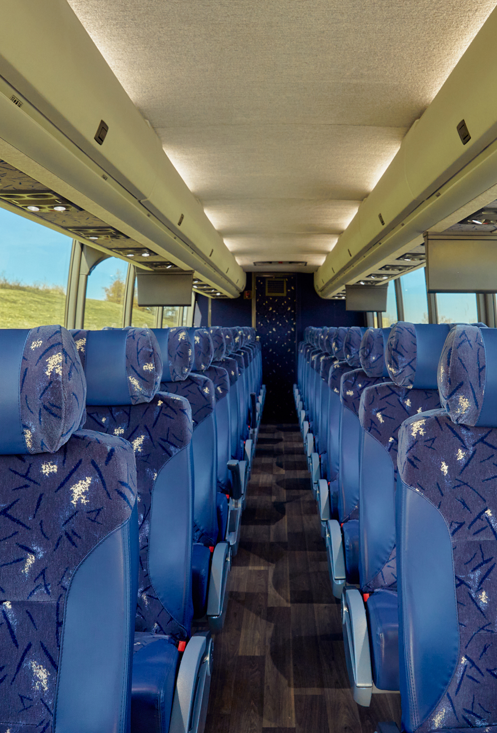 Passenger motorcoach charter bus seats and aisle