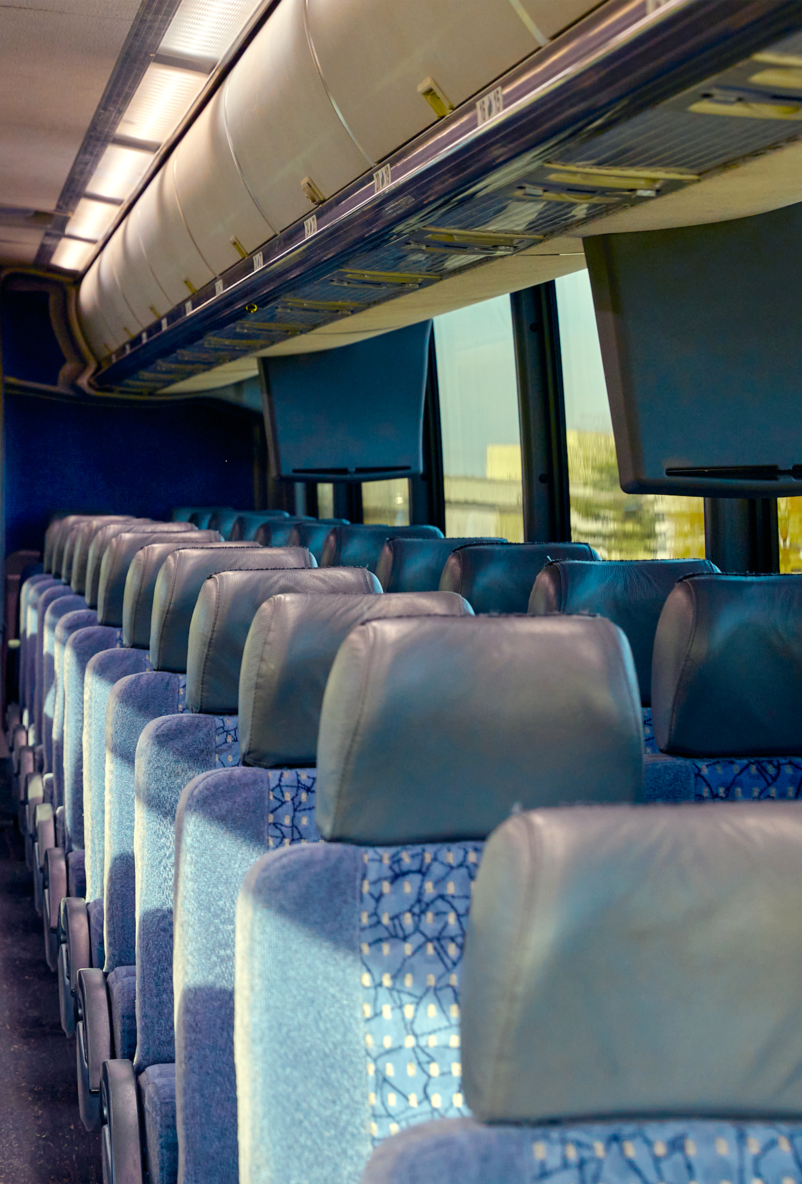 Passenger motorcoach charter bus seating headrest