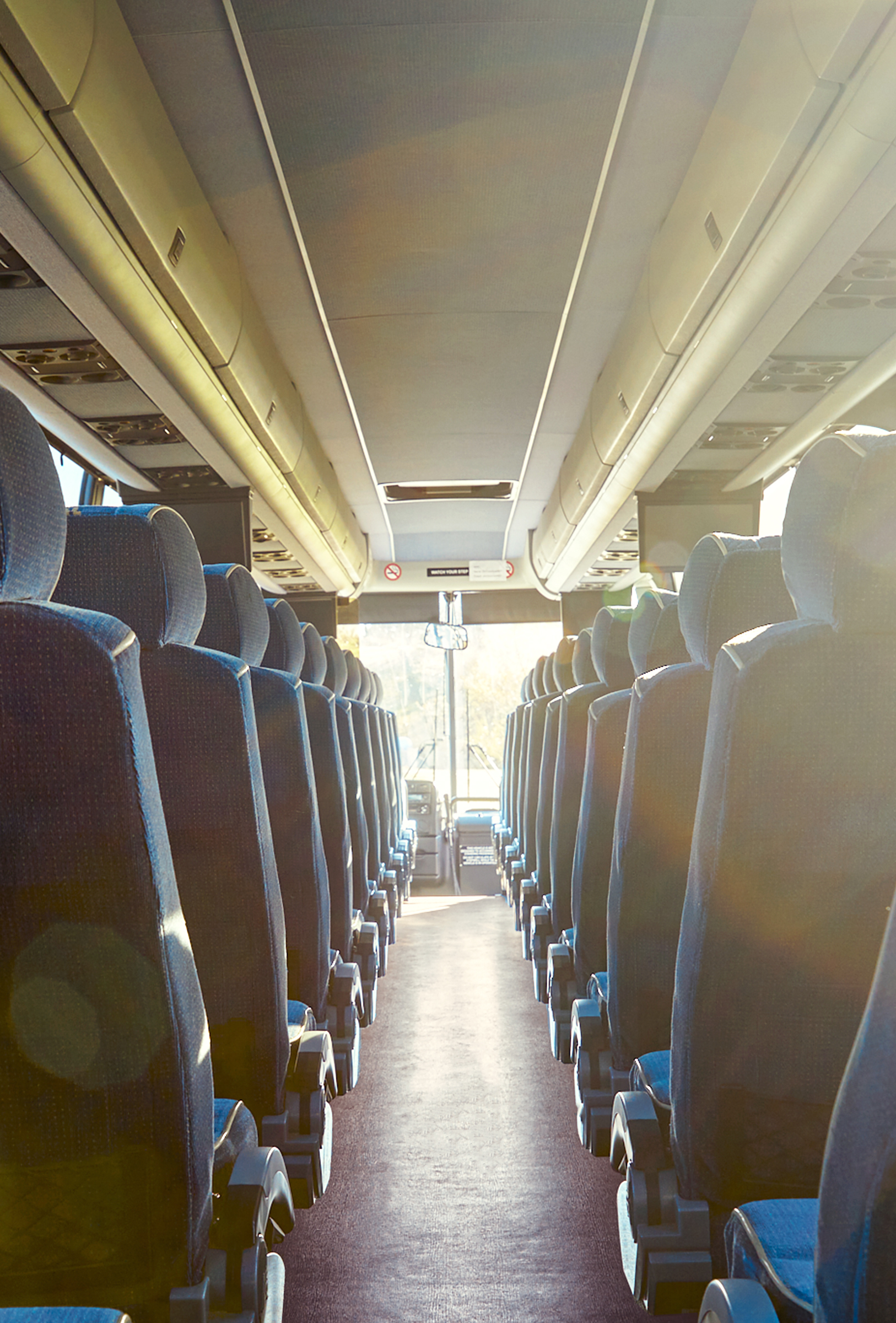 Passenger motorcoach charter bus seating and aisle