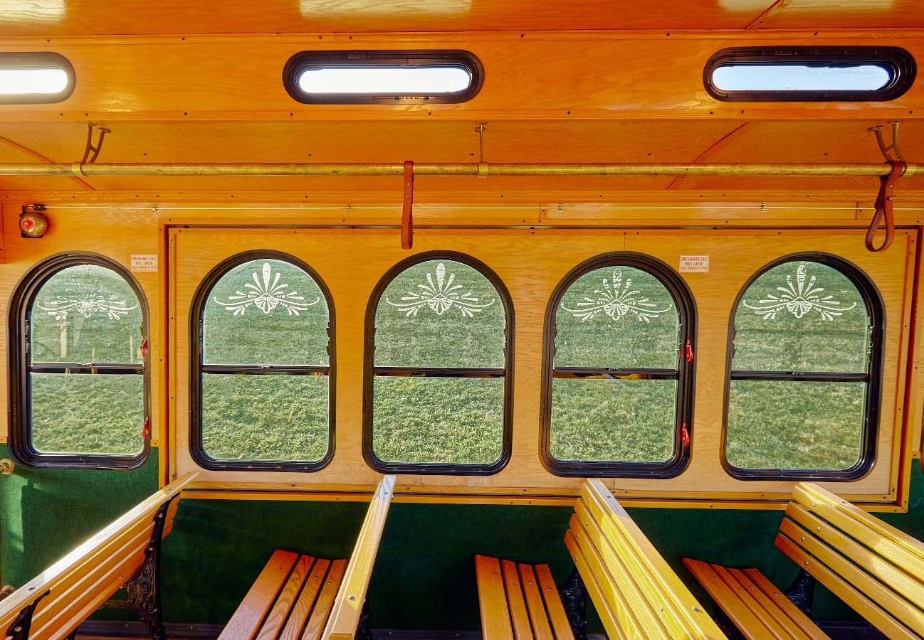 Etched-glass arched windows and oak interior detail