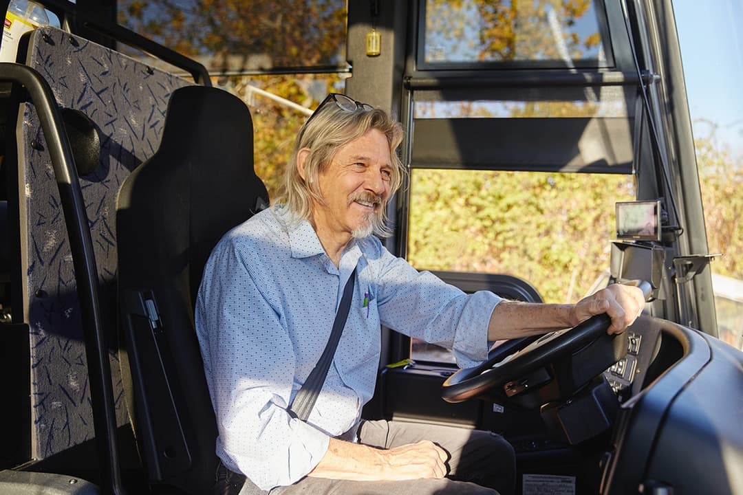 Dan Newby, owner of Crossroad Tours, at the wheel